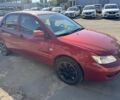 Красный Мицубиси Лансер, объемом двигателя 1.3 л и пробегом 200 тыс. км за 2300 $, фото 2 на Automoto.ua