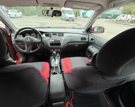 Червоний Міцубісі Lancer, об'ємом двигуна 1.6 л та пробігом 324 тис. км за 3299 $, фото 4 на Automoto.ua
