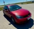 Червоний Міцубісі Lancer, об'ємом двигуна 1.6 л та пробігом 233 тис. км за 3800 $, фото 6 на Automoto.ua