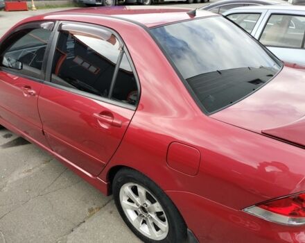 Красный Мицубиси Лансер, объемом двигателя 1.6 л и пробегом 273 тыс. км за 3622 $, фото 2 на Automoto.ua