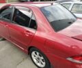 Красный Мицубиси Лансер, объемом двигателя 1.6 л и пробегом 273 тыс. км за 3622 $, фото 2 на Automoto.ua