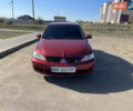 Червоний Міцубісі Lancer, об'ємом двигуна 1.58 л та пробігом 290 тис. км за 4350 $, фото 1 на Automoto.ua