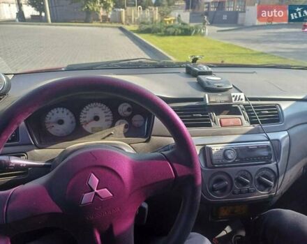 Красный Мицубиси Лансер, объемом двигателя 1.6 л и пробегом 73 тыс. км за 5500 $, фото 3 на Automoto.ua