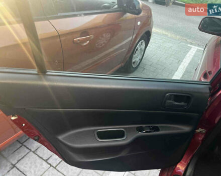 Красный Мицубиси Лансер, объемом двигателя 1.6 л и пробегом 312 тыс. км за 4600 $, фото 6 на Automoto.ua