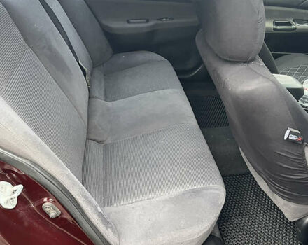 Червоний Міцубісі Lancer, об'ємом двигуна 2 л та пробігом 295 тис. км за 4150 $, фото 10 на Automoto.ua