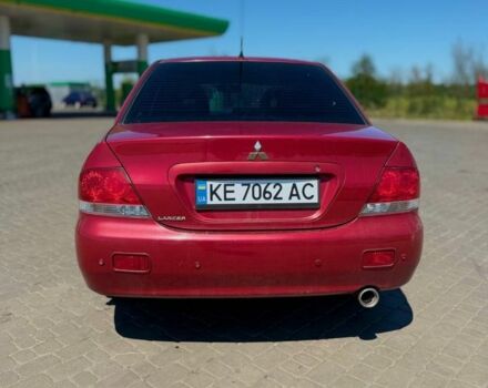 Червоний Міцубісі Lancer, об'ємом двигуна 1.6 л та пробігом 233 тис. км за 3800 $, фото 7 на Automoto.ua