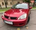 Червоний Міцубісі Lancer, об'ємом двигуна 1.6 л та пробігом 279 тис. км за 3999 $, фото 1 на Automoto.ua