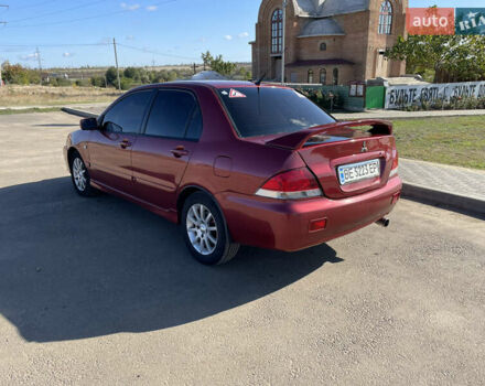 Червоний Міцубісі Lancer, об'ємом двигуна 1.58 л та пробігом 290 тис. км за 4350 $, фото 7 на Automoto.ua