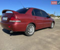 Мицубиси Лансер 2006 в Николаеве на Automoto.ua Красный Мицубиси Лансер, объемом двигателя 1.58 л и пробегом 290 тыс. км за 4350 $, фото 5 на Automoto.ua