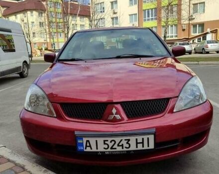 Красный Мицубиси Лансер, объемом двигателя 1.58 л и пробегом 176 тыс. км за 4200 $, фото 3 на Automoto.ua