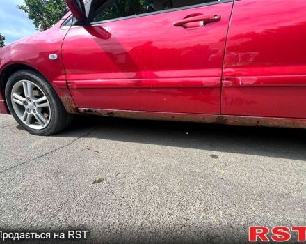 Красный Мицубиси Лансер, объемом двигателя 2 л и пробегом 223 тыс. км за 2900 $, фото 8 на Automoto.ua