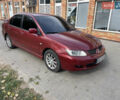 Червоний Міцубісі Lancer, об'ємом двигуна 1.58 л та пробігом 290 тис. км за 4250 $, фото 3 на Automoto.ua