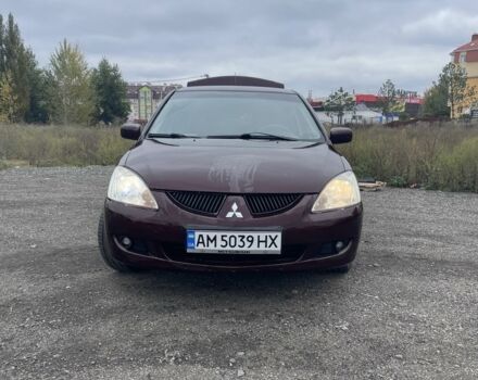 Красный Мицубиси Лансер, объемом двигателя 2 л и пробегом 295 тыс. км за 4150 $, фото 1 на Automoto.ua