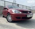 Червоний Міцубісі Lancer, об'ємом двигуна 1.6 л та пробігом 398 тис. км за 3499 $, фото 4 на Automoto.ua