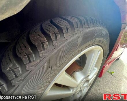 Красный Мицубиси Лансер, объемом двигателя 2 л и пробегом 223 тыс. км за 2900 $, фото 7 на Automoto.ua