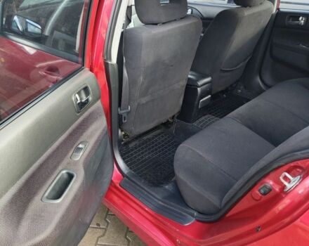 Червоний Міцубісі Lancer, об'ємом двигуна 2 л та пробігом 280 тис. км за 4500 $, фото 5 на Automoto.ua