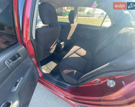 Красный Мицубиси Лансер, объемом двигателя 1.6 л и пробегом 290 тыс. км за 4350 $, фото 12 на Automoto.ua