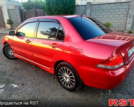 Мицубиси Лансер 2006 в Николаеве на Automoto.ua Красный Мицубиси Лансер, объемом двигателя 1.6 л и пробегом 260 тыс. км за 4600 $, фото 2 на Automoto.ua