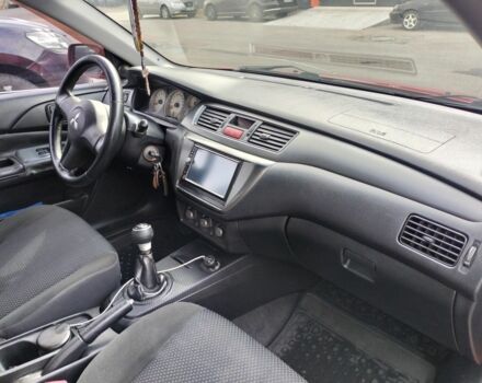 Красный Мицубиси Лансер, объемом двигателя 1.6 л и пробегом 273 тыс. км за 3622 $, фото 7 на Automoto.ua