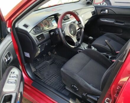 Червоний Міцубісі Lancer, об'ємом двигуна 2 л та пробігом 280 тис. км за 4500 $, фото 3 на Automoto.ua