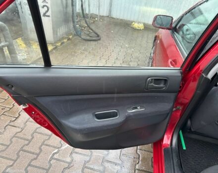 Червоний Міцубісі Lancer, об'ємом двигуна 1.6 л та пробігом 185 тис. км за 5000 $, фото 11 на Automoto.ua