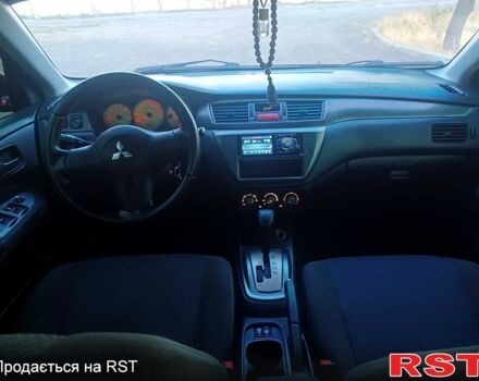 Мицубиси Лансер 2006 в Николаеве на Automoto.ua Красный Мицубиси Лансер, объемом двигателя 1.6 л и пробегом 260 тыс. км за 4600 $, фото 8 на Automoto.ua