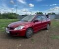 Червоний Міцубісі Lancer, об'ємом двигуна 1.6 л та пробігом 217 тис. км за 3800 $, фото 1 на Automoto.ua