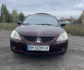 Червоний Міцубісі Lancer, об'ємом двигуна 2 л та пробігом 295 тис. км за 4150 $, фото 2 на Automoto.ua
