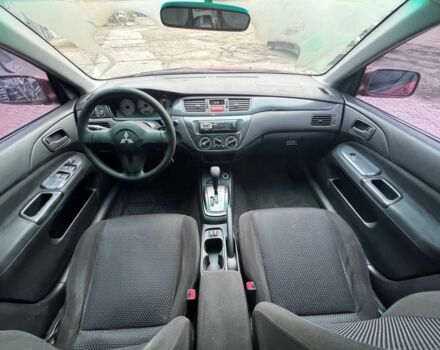 Красный Мицубиси Лансер, объемом двигателя 1.6 л и пробегом 276 тыс. км за 4350 $, фото 13 на Automoto.ua