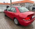 Червоний Міцубісі Lancer, об'ємом двигуна 1.6 л та пробігом 185 тис. км за 5000 $, фото 3 на Automoto.ua