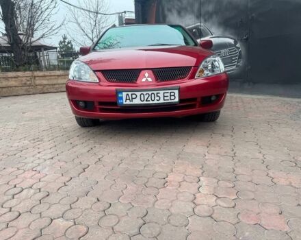 Красный Мицубиси Лансер, объемом двигателя 1.6 л и пробегом 276 тыс. км за 4350 $, фото 1 на Automoto.ua