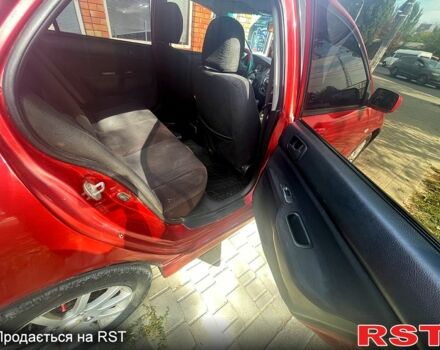 Червоний Міцубісі Lancer, об'ємом двигуна 1.6 л та пробігом 290 тис. км за 4250 $, фото 7 на Automoto.ua