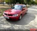 Червоний Міцубісі Lancer, об'ємом двигуна 1.6 л та пробігом 290 тис. км за 4250 $, фото 1 на Automoto.ua