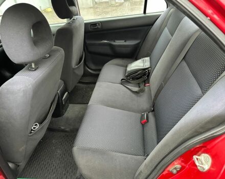 Червоний Міцубісі Lancer, об'ємом двигуна 1.6 л та пробігом 185 тис. км за 5000 $, фото 12 на Automoto.ua