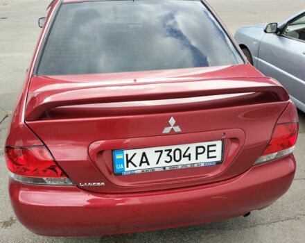 Красный Мицубиси Лансер, объемом двигателя 1.6 л и пробегом 273 тыс. км за 3622 $, фото 1 на Automoto.ua