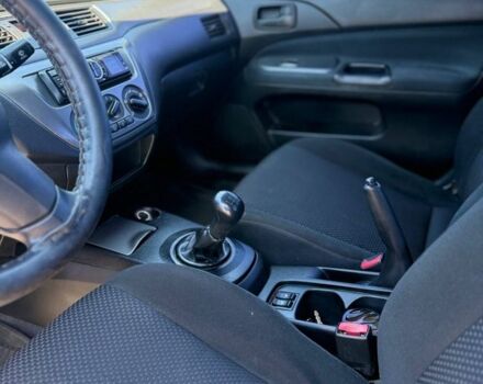 Червоний Міцубісі Lancer, об'ємом двигуна 1.6 л та пробігом 233 тис. км за 3800 $, фото 2 на Automoto.ua