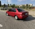 Красный Мицубиси Лансер, объемом двигателя 1.6 л и пробегом 250 тыс. км за 3300 $, фото 1 на Automoto.ua