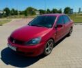 Червоний Міцубісі Lancer, об'ємом двигуна 1.6 л та пробігом 233 тис. км за 3800 $, фото 1 на Automoto.ua