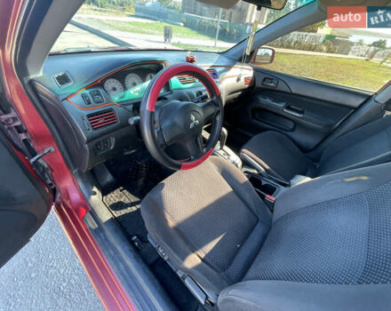 Червоний Міцубісі Lancer, об'ємом двигуна 1.58 л та пробігом 290 тис. км за 4350 $, фото 9 на Automoto.ua