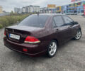 Червоний Міцубісі Lancer, об'ємом двигуна 2 л та пробігом 295 тис. км за 4150 $, фото 4 на Automoto.ua