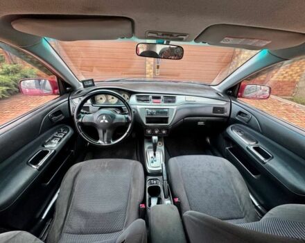 Красный Мицубиси Лансер, объемом двигателя 1.6 л и пробегом 239 тыс. км за 4100 $, фото 7 на Automoto.ua