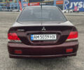 Червоний Міцубісі Lancer, об'ємом двигуна 2 л та пробігом 295 тис. км за 4150 $, фото 5 на Automoto.ua