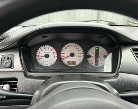 Червоний Міцубісі Lancer, об'ємом двигуна 1.6 л та пробігом 185 тис. км за 5000 $, фото 15 на Automoto.ua
