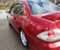Червоний Міцубісі Lancer, об'ємом двигуна 2 л та пробігом 280 тис. км за 4500 $, фото 2 на Automoto.ua
