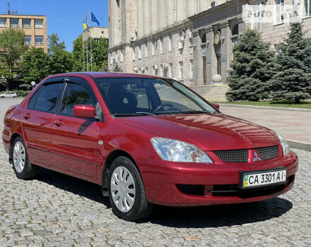 Червоний Міцубісі Lancer, об'ємом двигуна 1.58 л та пробігом 168 тис. км за 4999 $, фото 1 на Automoto.ua