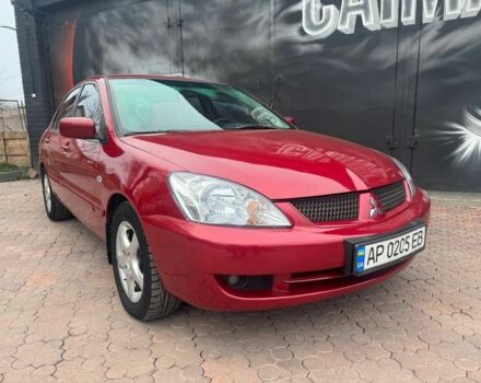 Красный Мицубиси Лансер, объемом двигателя 1.6 л и пробегом 276 тыс. км за 4350 $, фото 2 на Automoto.ua