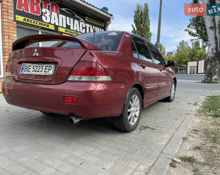 Червоний Міцубісі Lancer, об'ємом двигуна 1.58 л та пробігом 290 тис. км за 4250 $, фото 6 на Automoto.ua