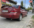 Червоний Міцубісі Lancer, об'ємом двигуна 1.58 л та пробігом 290 тис. км за 4250 $, фото 6 на Automoto.ua