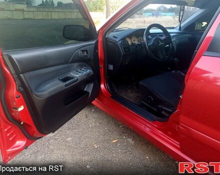 Мицубиси Лансер 2006 в Николаеве на Automoto.ua Красный Мицубиси Лансер, объемом двигателя 1.6 л и пробегом 260 тыс. км за 4600 $, фото 7 на Automoto.ua