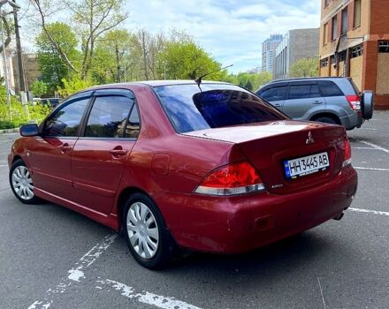 Червоний Міцубісі Lancer, об'ємом двигуна 1.6 л та пробігом 1 тис. км за 3990 $, фото 5 на Automoto.ua